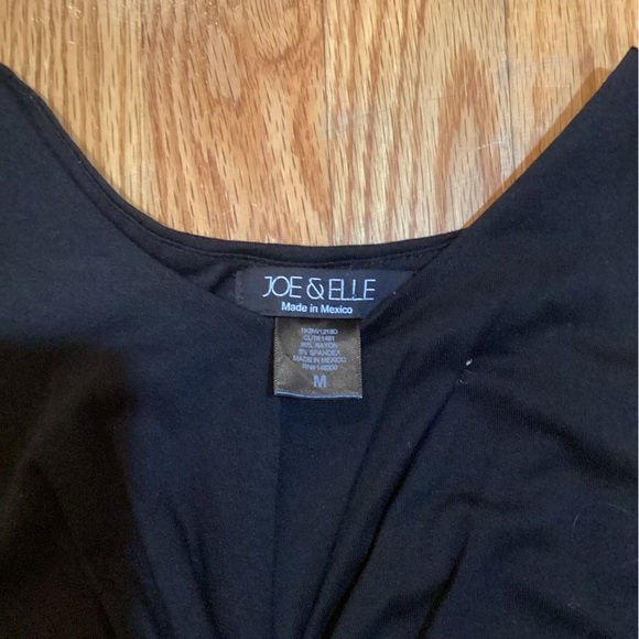 Elegant Black Sleeveless Dress - Picture 3 of 6